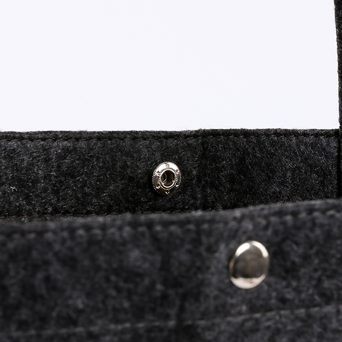 Felt bag with metal button